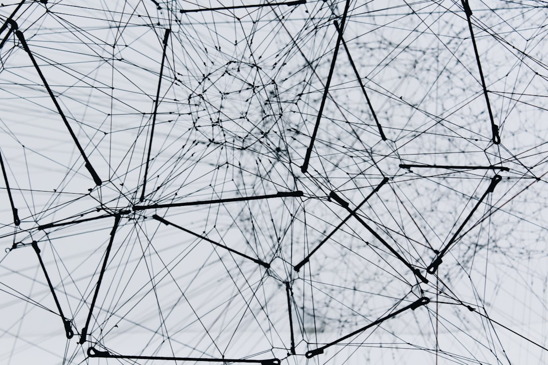 Dense network of connected nodes and lines, illustrating one customer joined across four systems